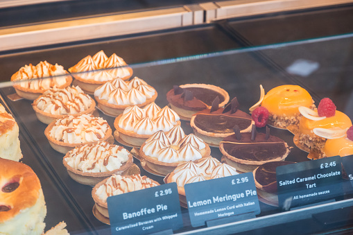A variety of desserts displayed at a local bakery in Muswell Hill in London, England