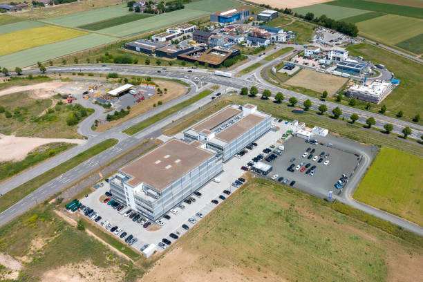 istock Large industrial buildings and office park. Developing area 1421602655