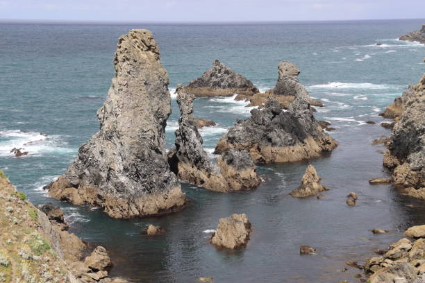 istock Jagged Rocks on the island 1421603532