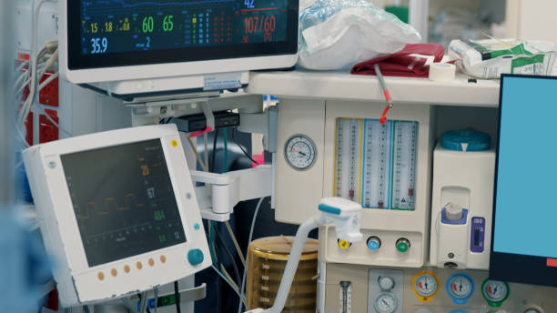 Medical device for monitoring vital signs in a hospital. This medical device monitors heart rate, oxygen levels, pressure in hospital patients. Ventilator stock photo