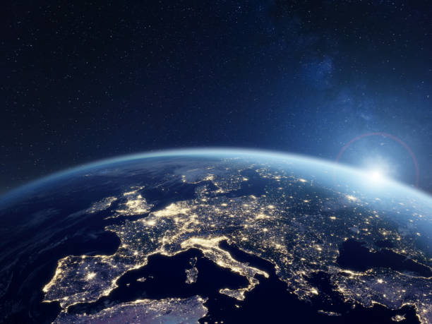Europe at night viewed from space with city lights showing activity in European Union countries. 3d render of planet Earth. Elements from NASA. Technology, global communication, world. stock photo