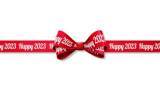 Happy 2023 written red tied bow ribbon sitting over white background. Horizontal composition with copy space. Happy 2023 concept.