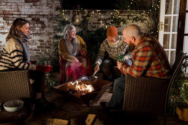 istock Tending to the Chestnuts on the Fire 1421616163