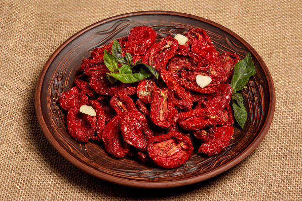 istock Bowl of sun dried tomatoes, top view 1421618834