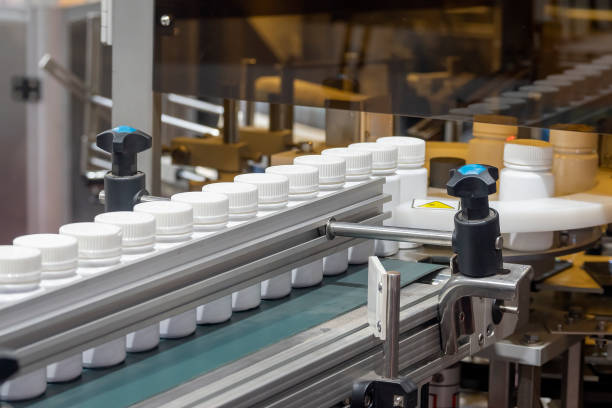 istock The drug filling process in the plastic bottle. 1421619023