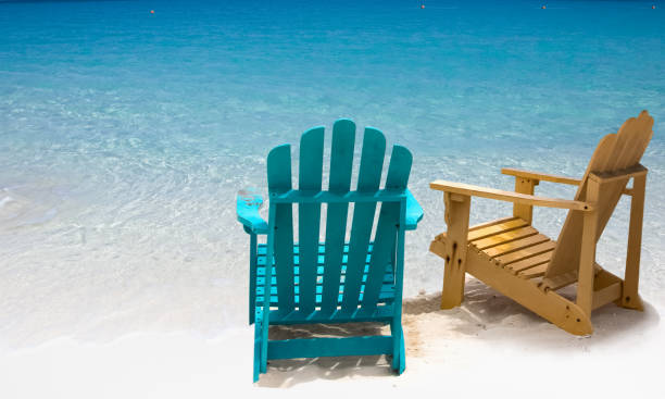 istock Two beach chairs on white sand Caribbean coast 1421621319