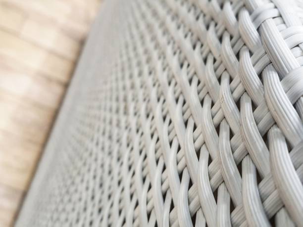 Close up photo of white artificial rattan wicker. stock photo