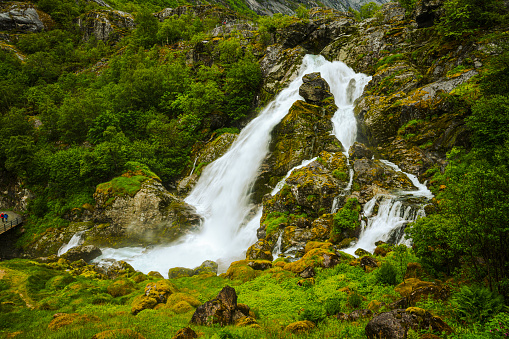 Waterfalls in the valley approaching Briksdal Glacier in Norway.