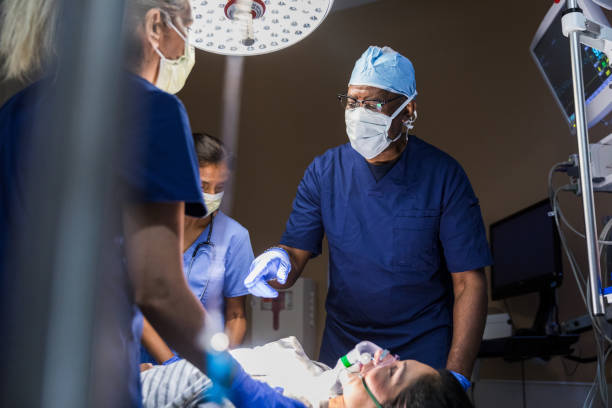 istock Doctor asks the nurse for help 1421626450