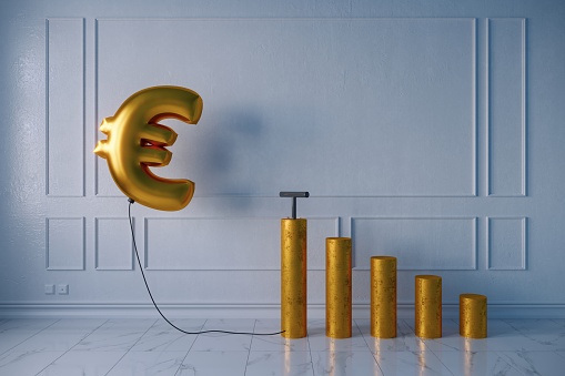 Pumped golden balloon shaped of euro sign with the growing bar graph on white wall, symbolizing inflation concept. (3d render)