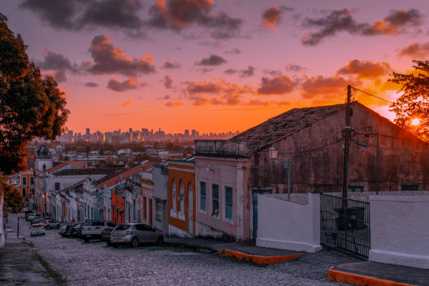 Sunset in Olinda city Olinda, Pernambuco, Brazil - September 03, 2022:View of colonial houses from a steep street in Olinda historic site. natal brazil stock pictures, royalty-free photos & images