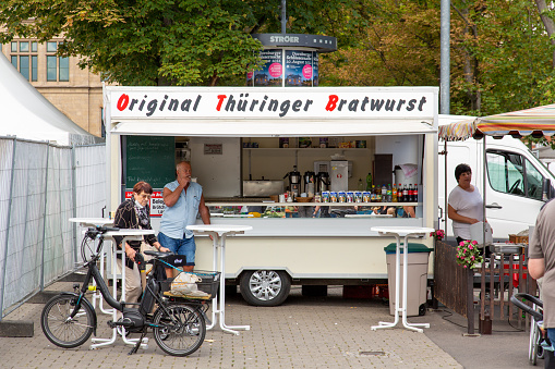 Erfurt, Germany, August 2022.  Famous Thüringer sausage stand on week market in Erfurt, Germany