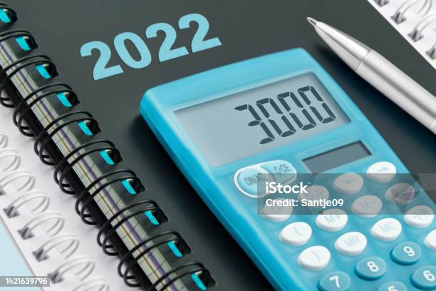 Calendar 2022 And Blue Calculator With 3000 Euro Stock Photo - Download Image Now - Bonus Pay, Inflation - Economics, Wages