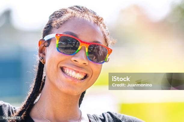 Smiling Afrolatinx Young Woman Looking At The Camera Stock Photo - Download Image Now