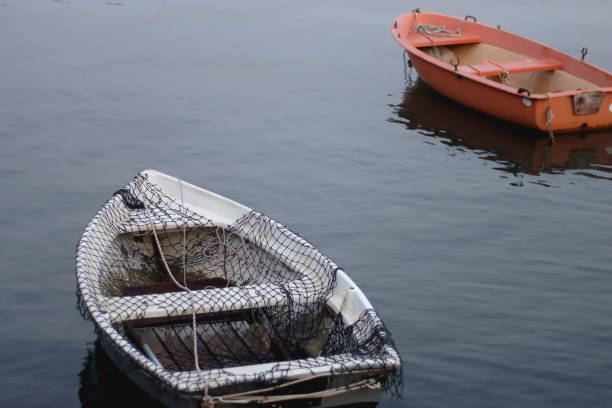 Bursa, Turkey-September 10, 2011: Old Empty Boats Standing by the Lake in Golyazi. Golyazi is a neighborhood in the Nilufer district of Bursa province.