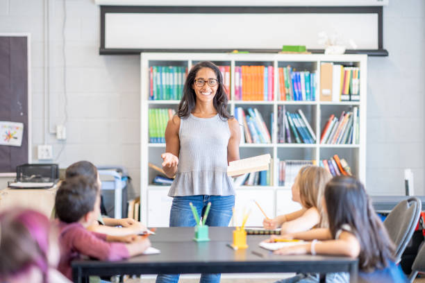 istock Montessori Teacher Working Through a Lesson 1421644879