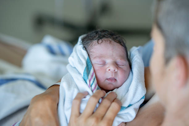 istock Mother With Her Newborn Baby 1421646408