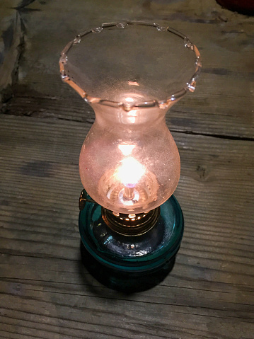 High angle view old lantern on the wood table