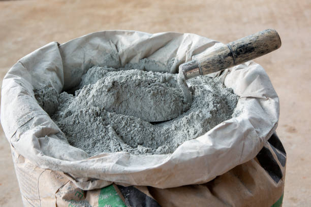 istock Cement powder and trowel put in bag package 1421654848