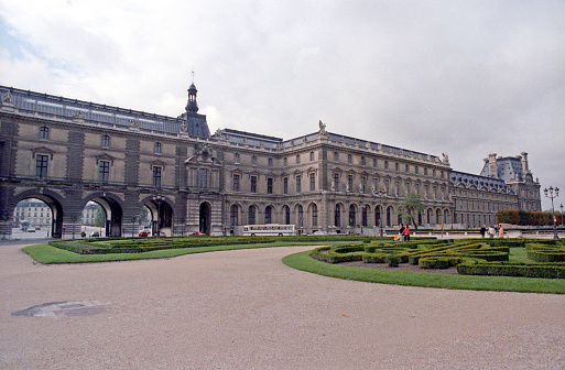 Paris, France - 1983: A vintage 1980's Fujifilm negative film scan of the grounds of the Palace of Versailles, the former royal residence built by King Louis XIV, outside of Paris, France.