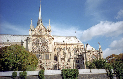 Cathedral Notre Dame in Paris. Sculptures details on ancient facade.