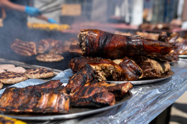 istock Cook grilling sausages 1421659232
