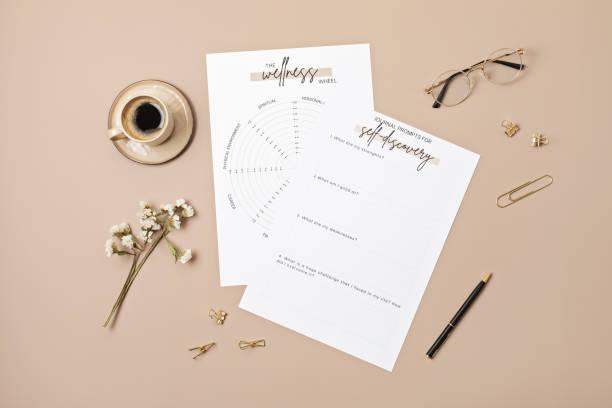 istock Desktop with life coaching templates and office accessories. Organization, self-development, online coaching concept. Top view, falt lay 1421660875