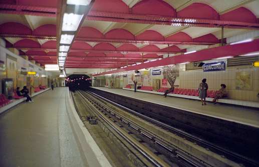 Paris, France - 1983: A vintage 1980's Fujifilm negative film scan of an underground Paris metro subway station.