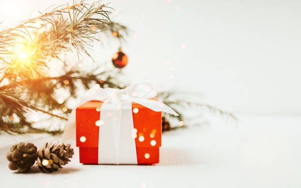 istock Spruce branches, red box and Christmas balls 1421662018
