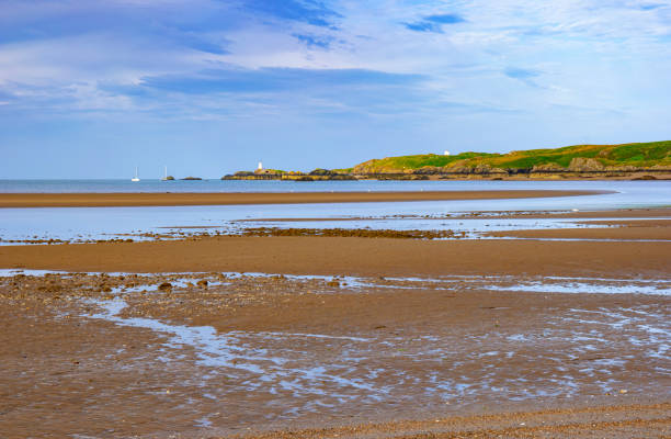 The beach of Anglesey with Llandwyn Island in the background
