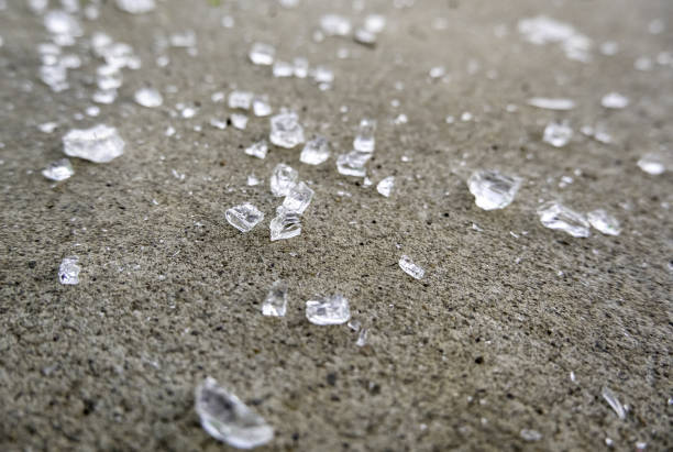 Detail of broken glass in the garbage, danger due to cuts