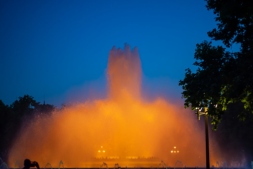 Night Photograph Of The Performance Of The Singing Magic Fountain Of Montjuic In Barcelona, Catalonia, Spain.
