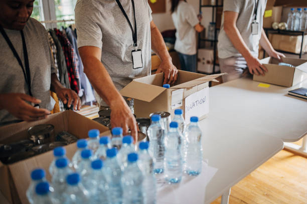 istock Volunteers working in charity center 1421674434