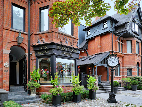 Toronto, Canada - September 5, 2022:  The Yorkville Village area has old houses that have been converted into elegant boutiques.