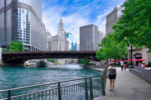 The Riverwalk along the Chicago River has benches and cafes stock photo