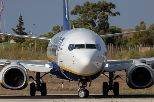 Luqa, Malta - September 7, 2022: Ryanair Boeing 737-8AS (REG: 9H-QDD) exiting from taxiway Foxtrot for take off.