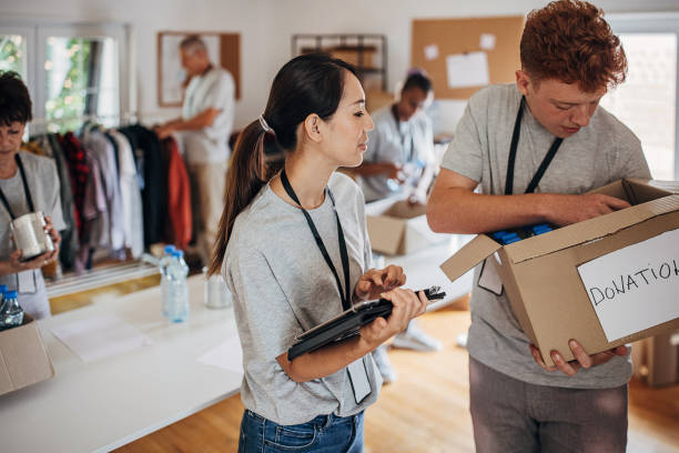 istock Volunteers working with donations 1421681028
