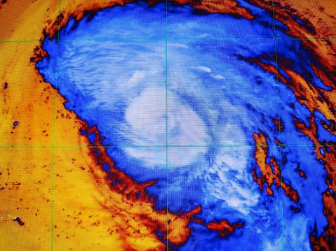 Hurricane Earl gathers strength in the Atlantic. A color enhanced satellite image of Earl as it develops into a hurricane. Earl is expected to gather strength into a major storm, the first one of 2022. The false color image depicts cloud tops whereby brighter white relate to higher and more moist conditions. The eye is not well shown in the satellite image.