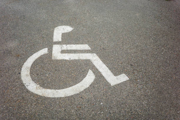 istock sign automobile parking for the disabled road markings 1421696417