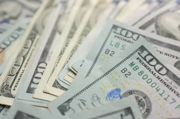 istock Money hundred dollars banknotes 1421696978