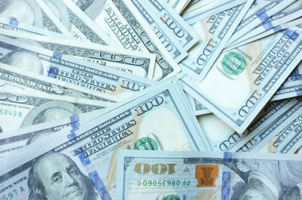istock Money hundred dollars banknotes 1421697284