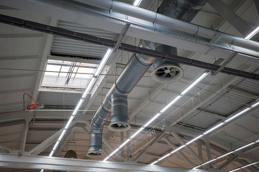 air conditioning in an industrial room on the ceiling, industrial ventilation systems in the building