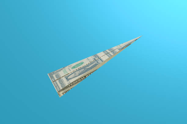 istock US Dollar Bill Paper Airplanes Moving Up 1421697881