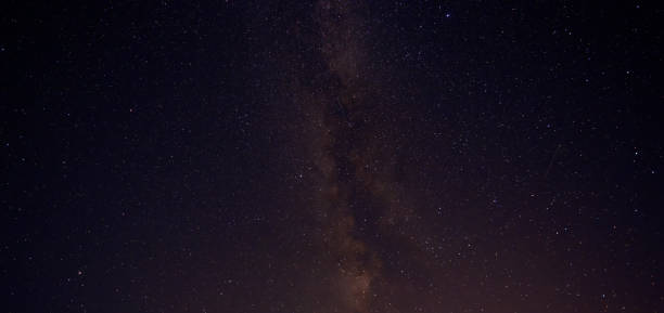 istock Night starry sky. Milky Way Abstract dark background. 1421697889