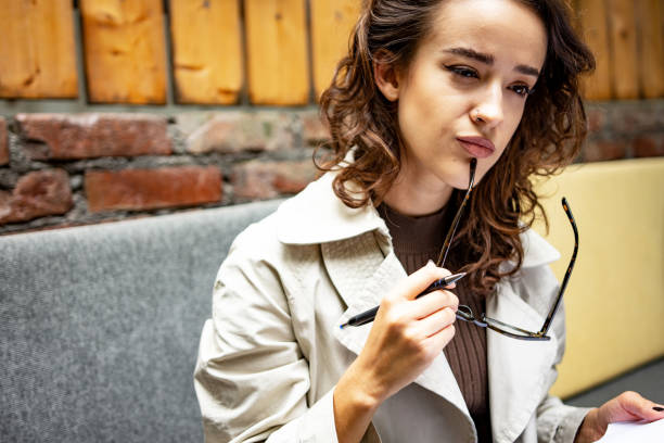 istock Beautiful young businesswoman working 1421702367