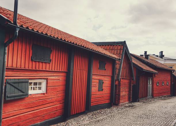 istock traditional old red buildings in city 1421721142