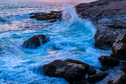 Crashing waves on rocky shore at Schoodic Peninsula, Acadia National Park, Maine, USA