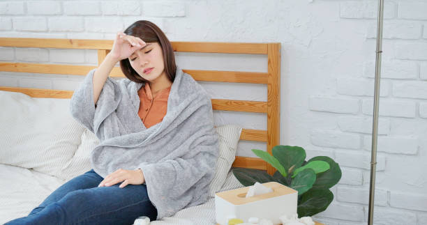 istock woman is sick 1421744306