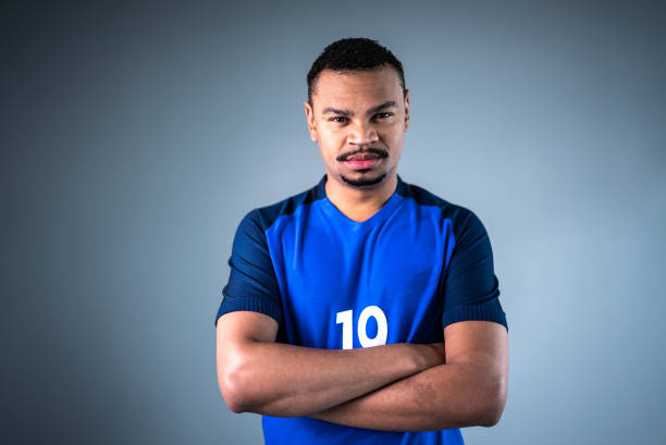Male athlete / fan celebrating on blue uniform