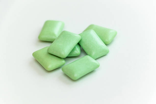 istock Green granular gum on the white table 1421753279
